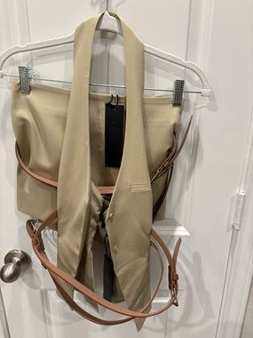 Lioness Beige Vest with Black Tag Detail